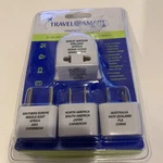Sealed Travel Smart Adapter Plug Set With Pouch- New! Ax. Fixed Price $12.00.