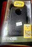 Otterbox Defender Series Case For Iphone 5C Black New Un-opened. Fixed Price $25.00.