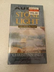 Simon Schuster Audio The Stone Of Light Wise Woman By Christian Jacq. Fixed Price $12.00.