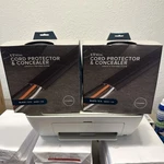 Two Wire Cord Protector & Concealer 5'L Black (UTW-CP501-GY). Fixed Price $19.99.