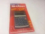 Vintage Sharp Elsi-mate EL-326S Solar Cell Calculator With Booklet & Case Sealed. Fixed Price $9.99.