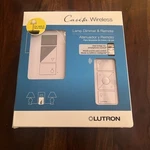 Lutron Caseta P-PKG1P-WH-R Wireless Smart Lighting Lamp Dimmer And Remote Kit. Fixed Price $42.00.