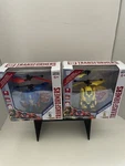 Two, World Tech Toys: Transformer Bumblebee/ Optimus Prime. Helicopters New SET2. Fixed Price $29.99.