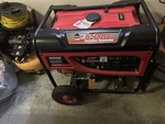 Smarter Tools GP-6500 6500W Gasoline Generator Red/black Recoil Start. Fixed Price $450.00.